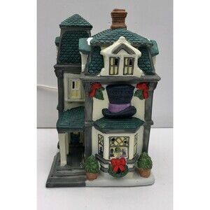 VILLAGE SQUARE COLLECTIBLES PORCLEAIN LIGHTED HOUSE "HATFIELDS HABERDASHERY"